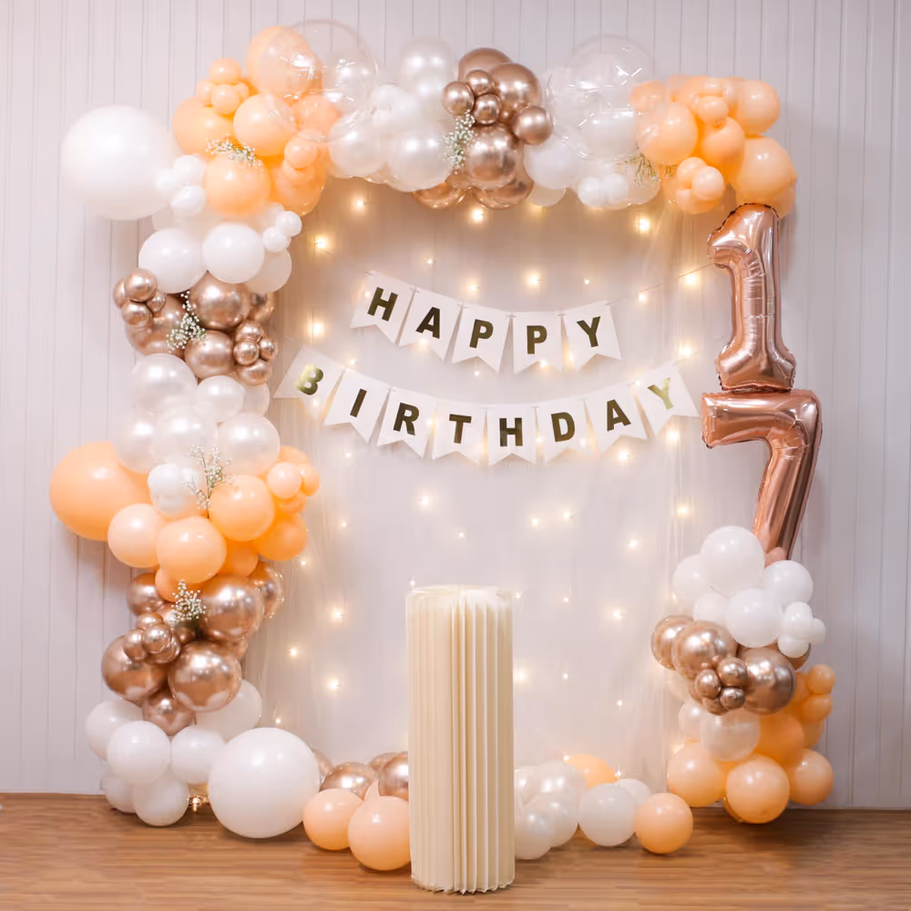 Warm b’day celebration with colourful decor of balloons, fairy lights and bunting