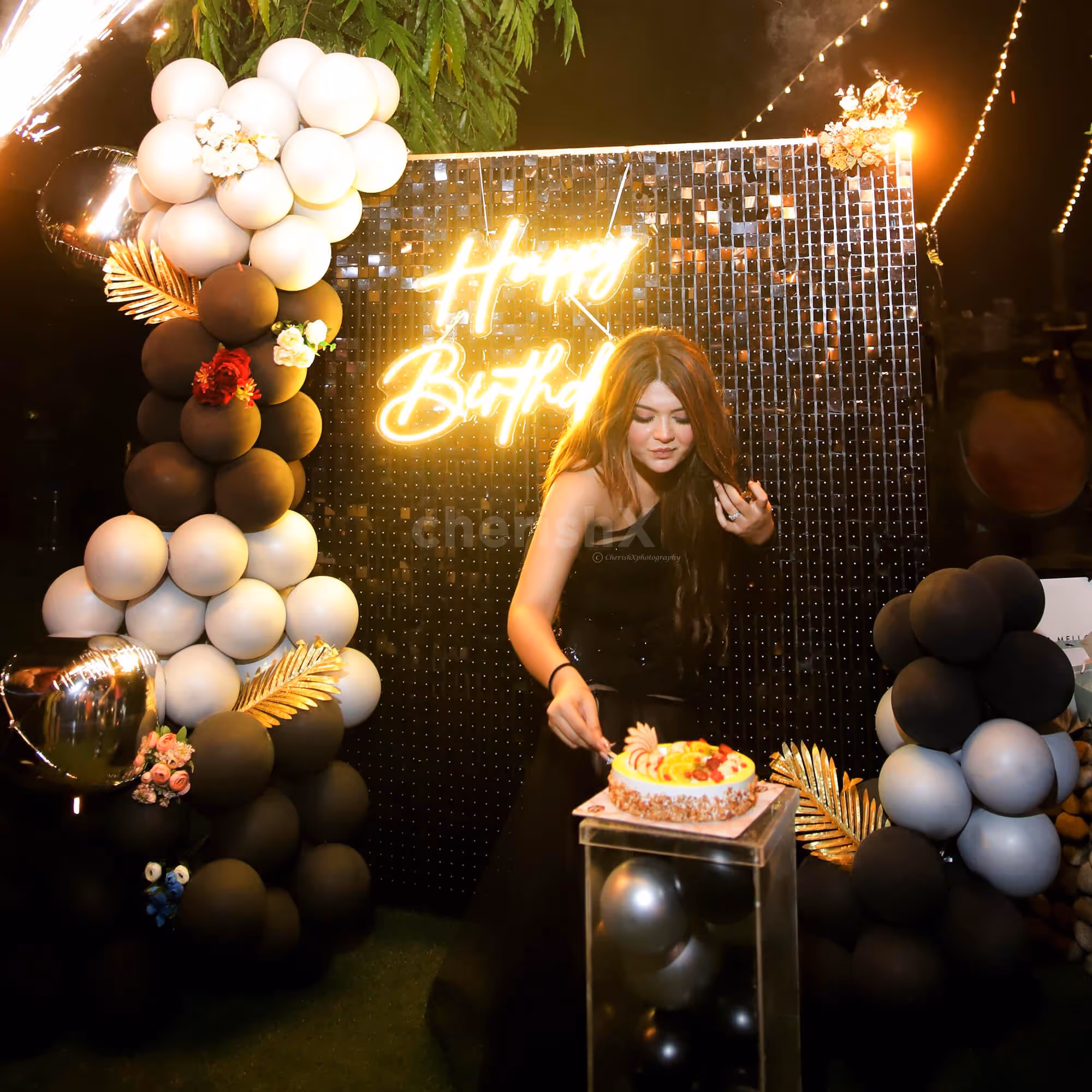 The black and silver arch is the highlight of any celebration!