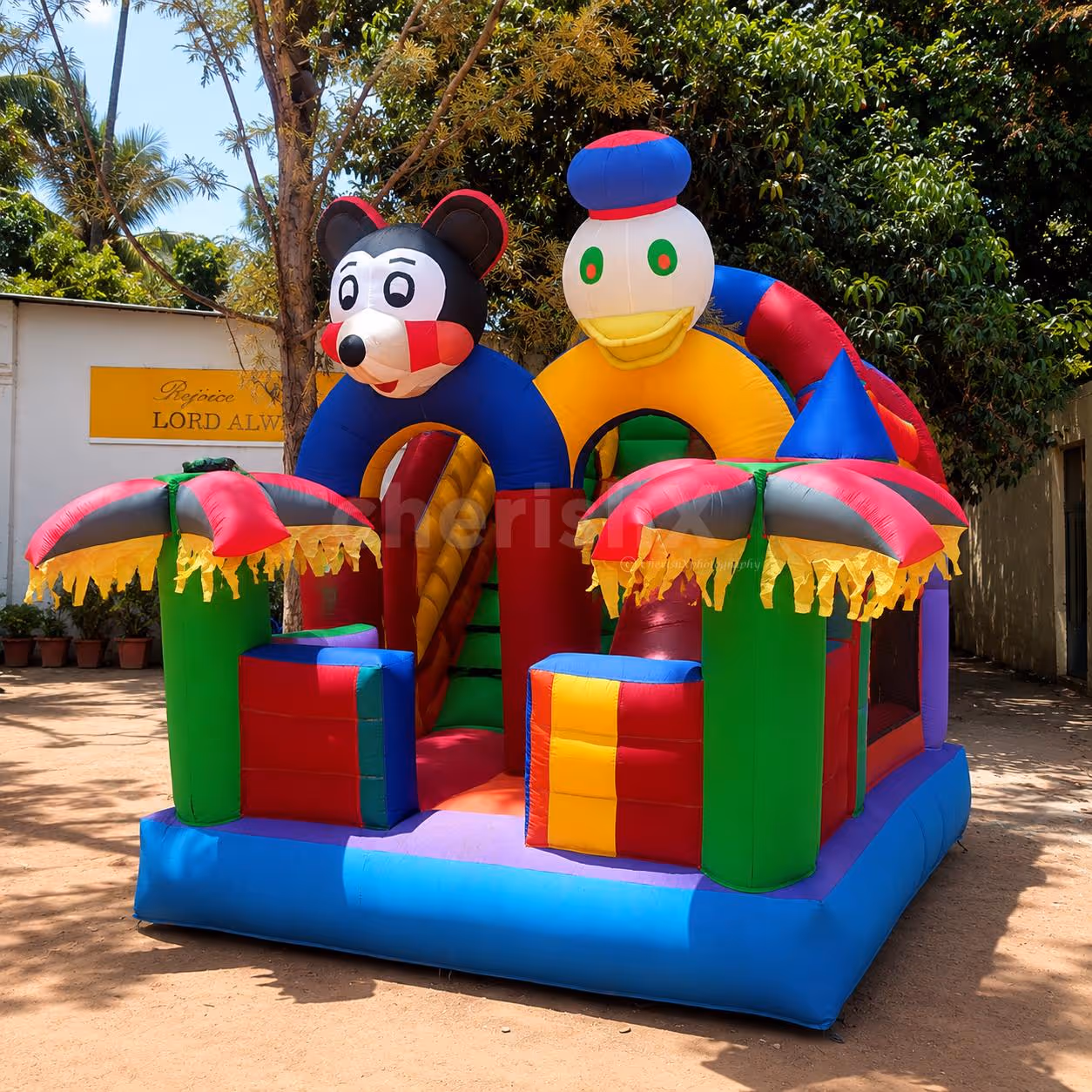 This Vibrant Kids' Bouncy Setup Keeps Kids Engaged For Hours While Adults Enjoy Themselves.