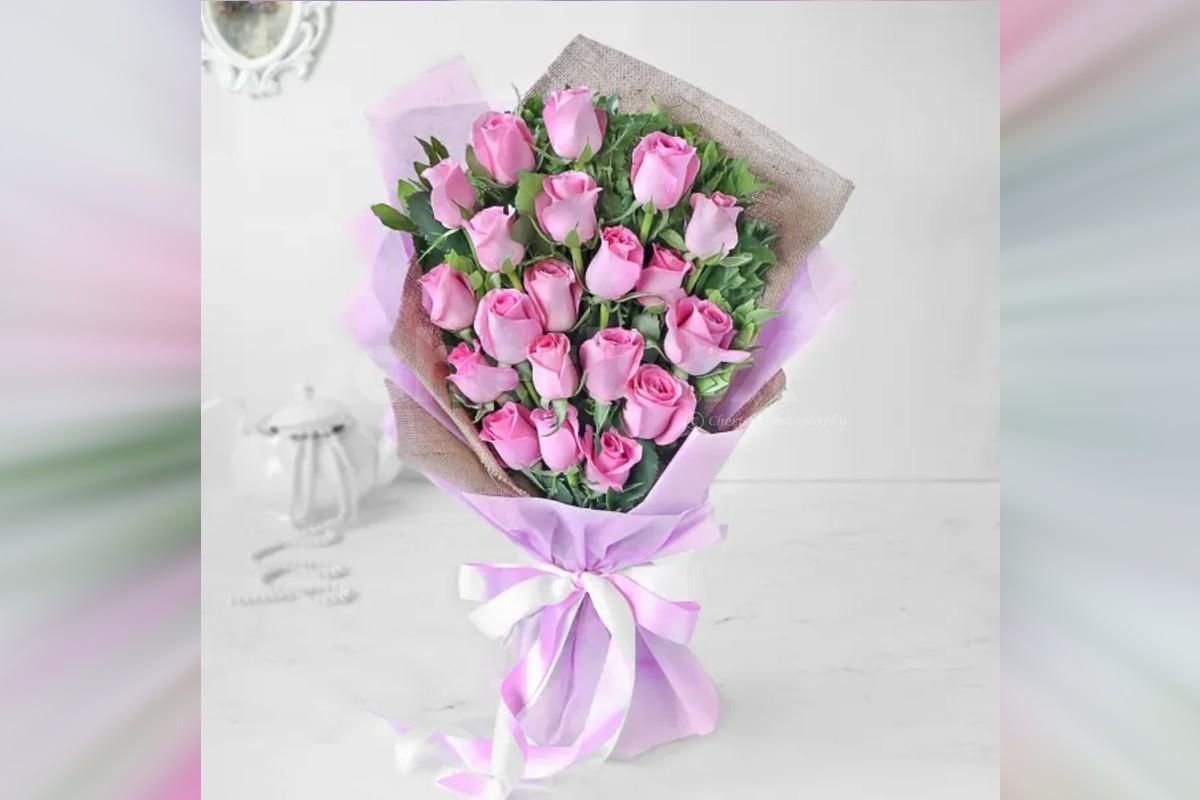 Beautiful Bouquet of 20 Pretty Pink Roses to brighten your loved one's day.