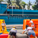 Exciting inflatable bungee run where kids race and shoot basketballs