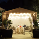 Enjoy a romantic alfresco experience in a beautifully decorated cabana at Hilton.