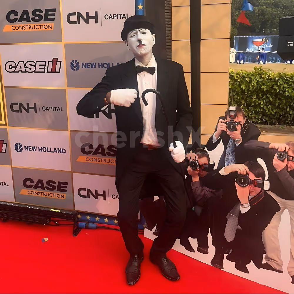 Live Charlie Chaplin character entertaining kids at a birthday party