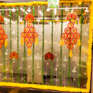 Artificial garlands and pan leaves maintain their vibrancy without wilting for long
