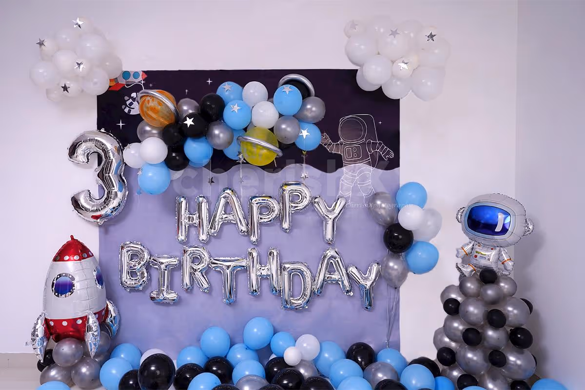 Celebrate your kid's birthday with this adorable Space themed birthday room decor.