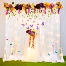 A fantastical white satin backdrop for your roka ceremony