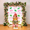 A 6x6ft flex backdrop stand with oversized lotus flowers and lush green leaves