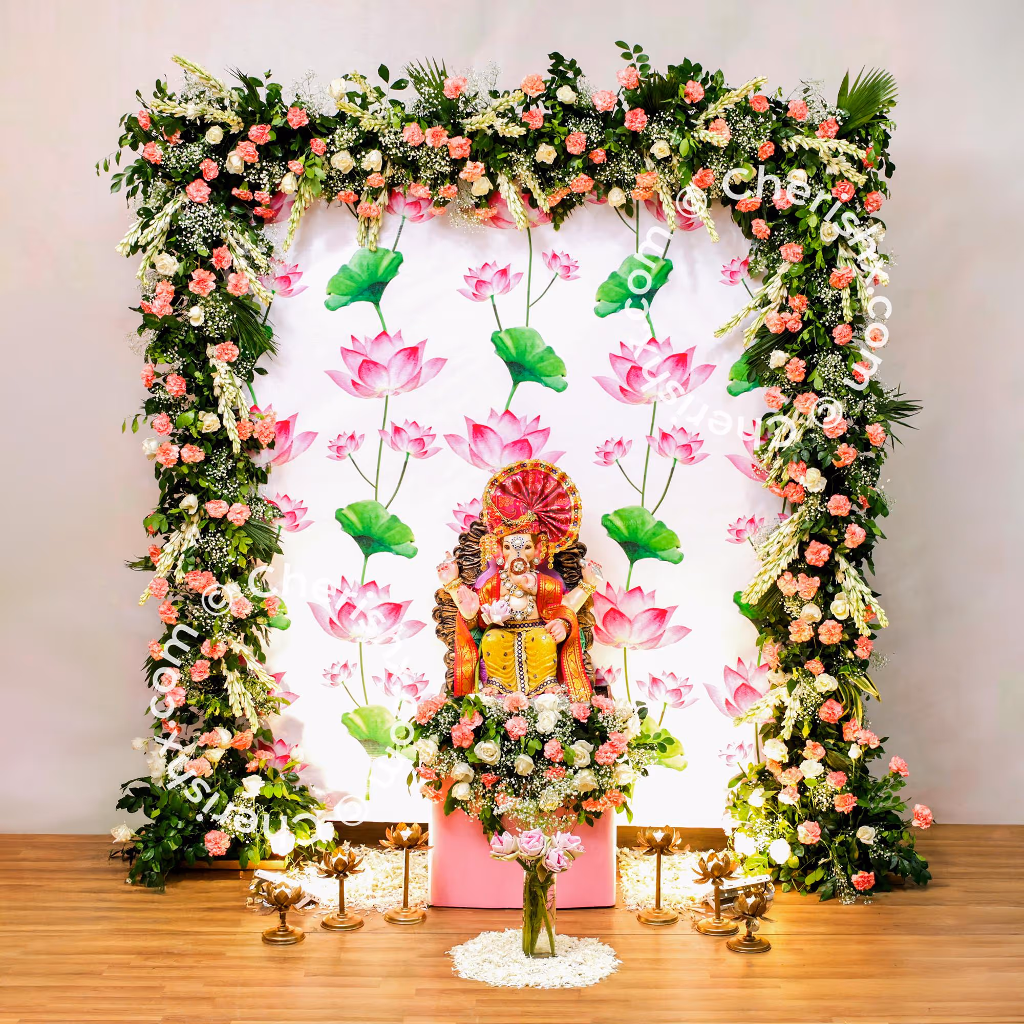 A 6x6ft flex backdrop stand with oversized lotus flowers and lush green leaves