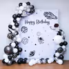 Glowing galaxy flex backdrop under a neon birthday sign.