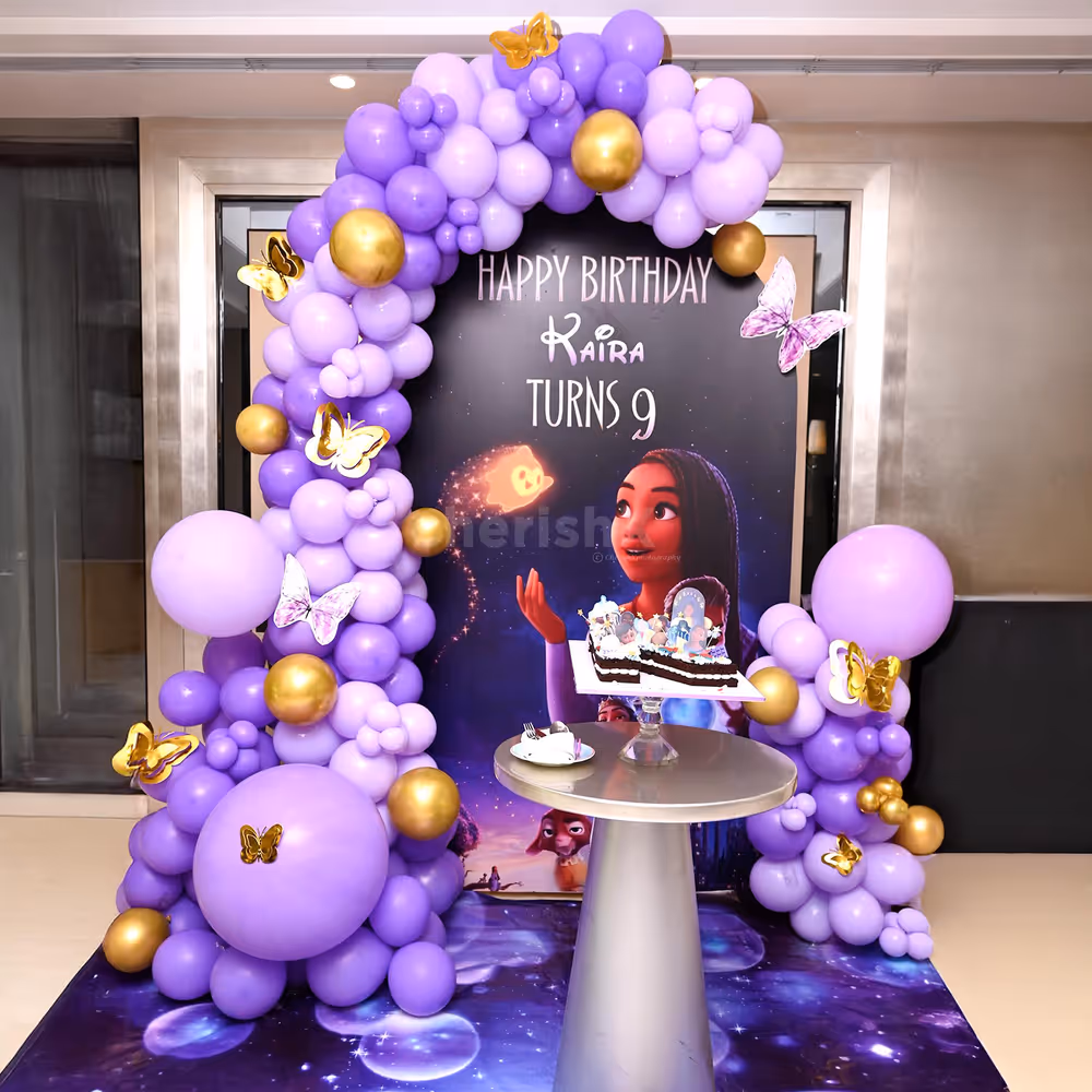 Wish-themed galaxy birthday setup shining in purple hues.