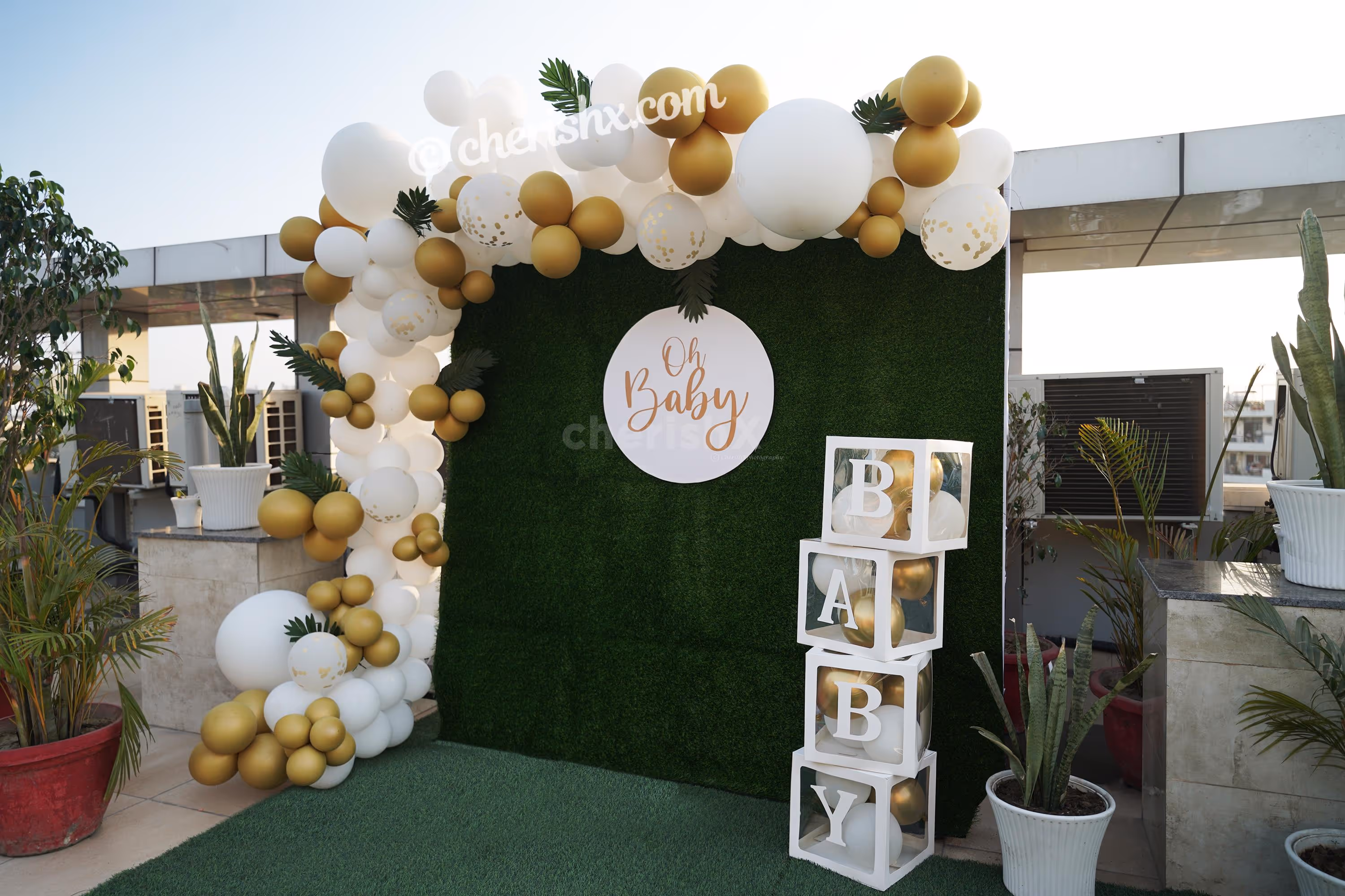 Celebrate the birth of your child with these bright Golden and White Baby Shower Decor!
