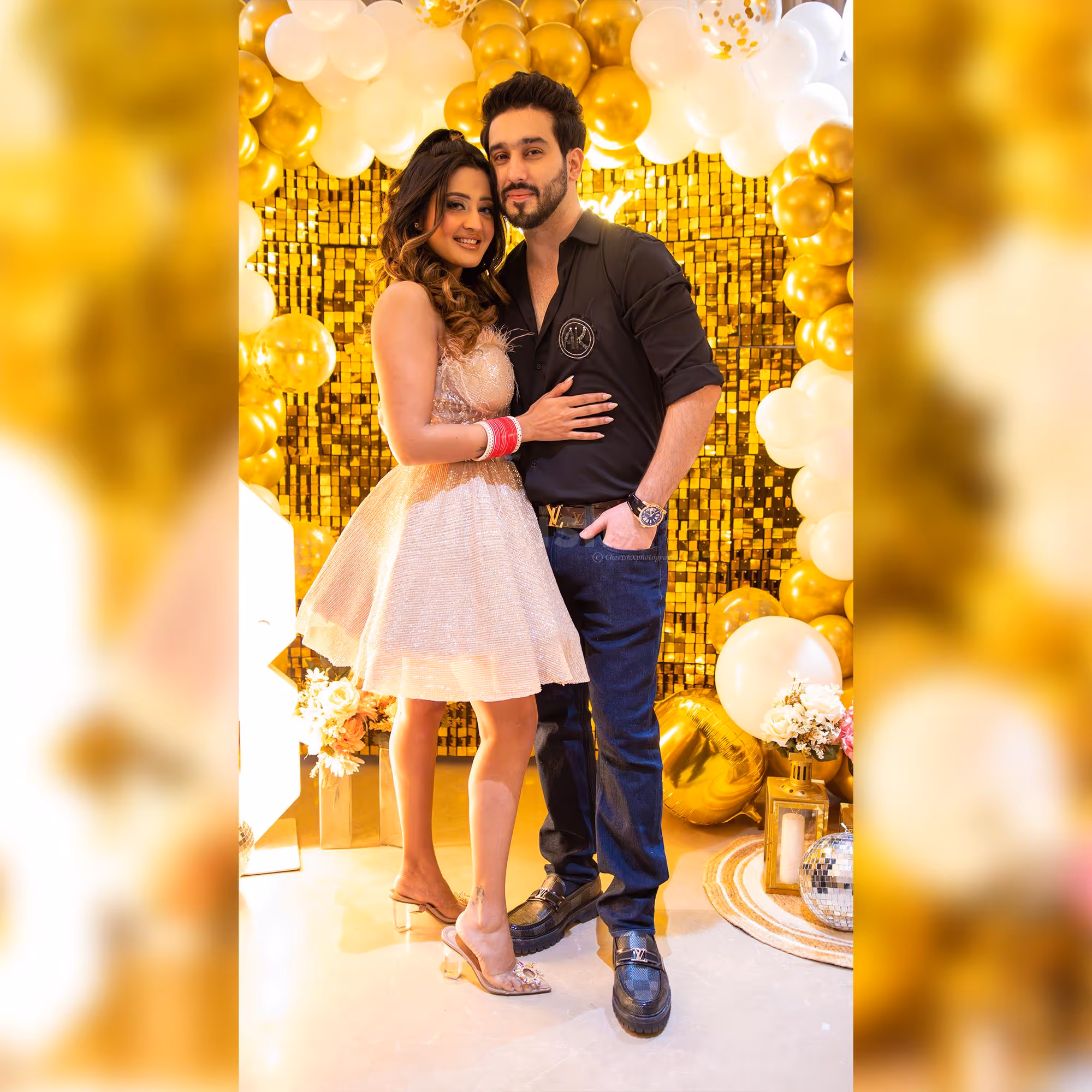 Make a statement with this golden sequin backdrop for your birthday party.