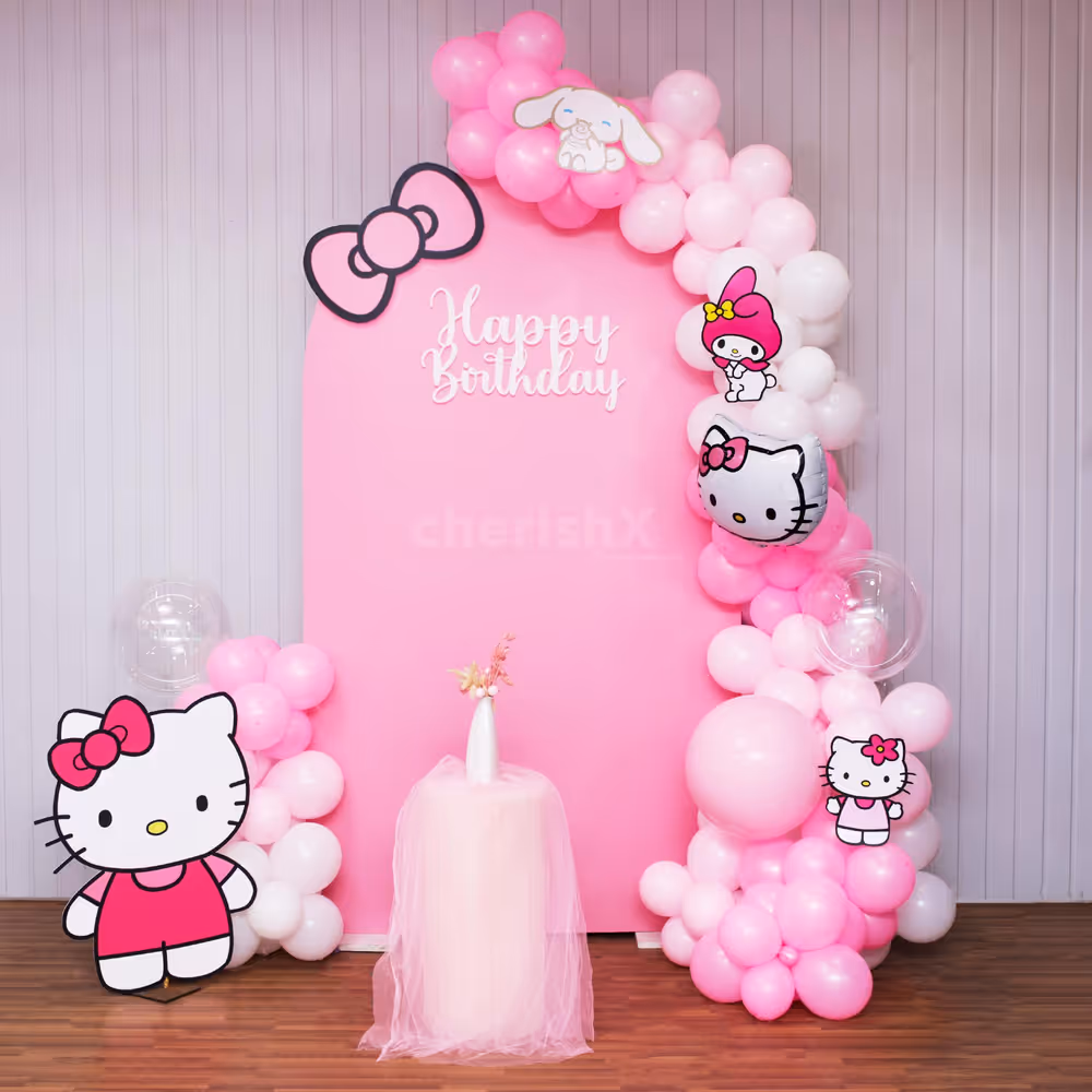 Pastel pink Hello Kitty backdrop for a picture-perfect party.