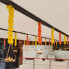 Brass lotus decor elements add glow with warm, festive lighting.