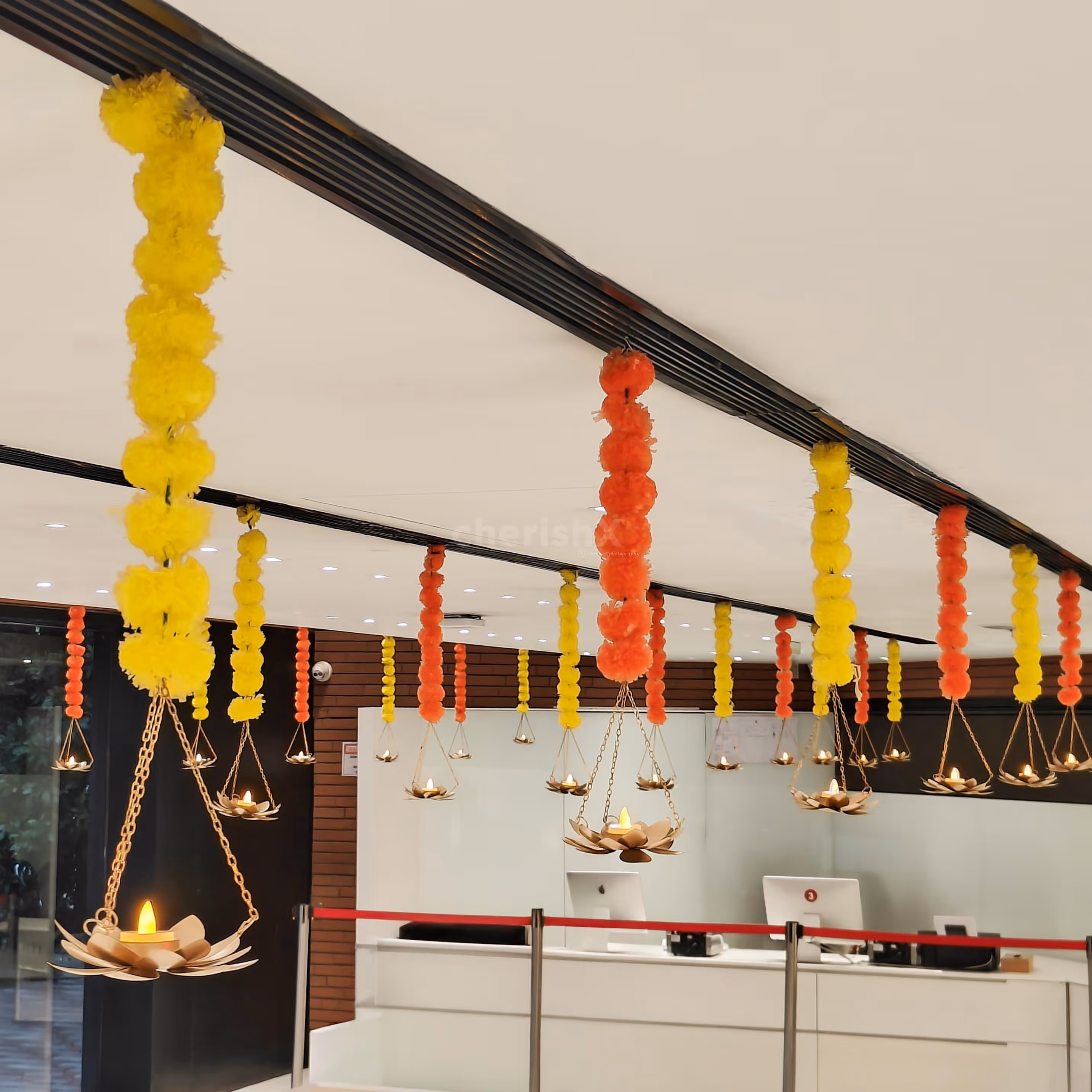 Brass lotus decor elements add glow with warm, festive lighting.
