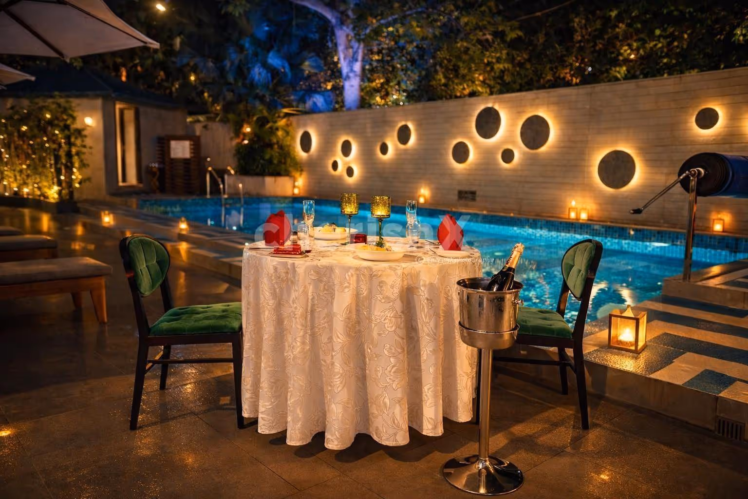 Romantic poolside dinner setup for Karwa Chauth celebrations at The Connaught, Delhi.