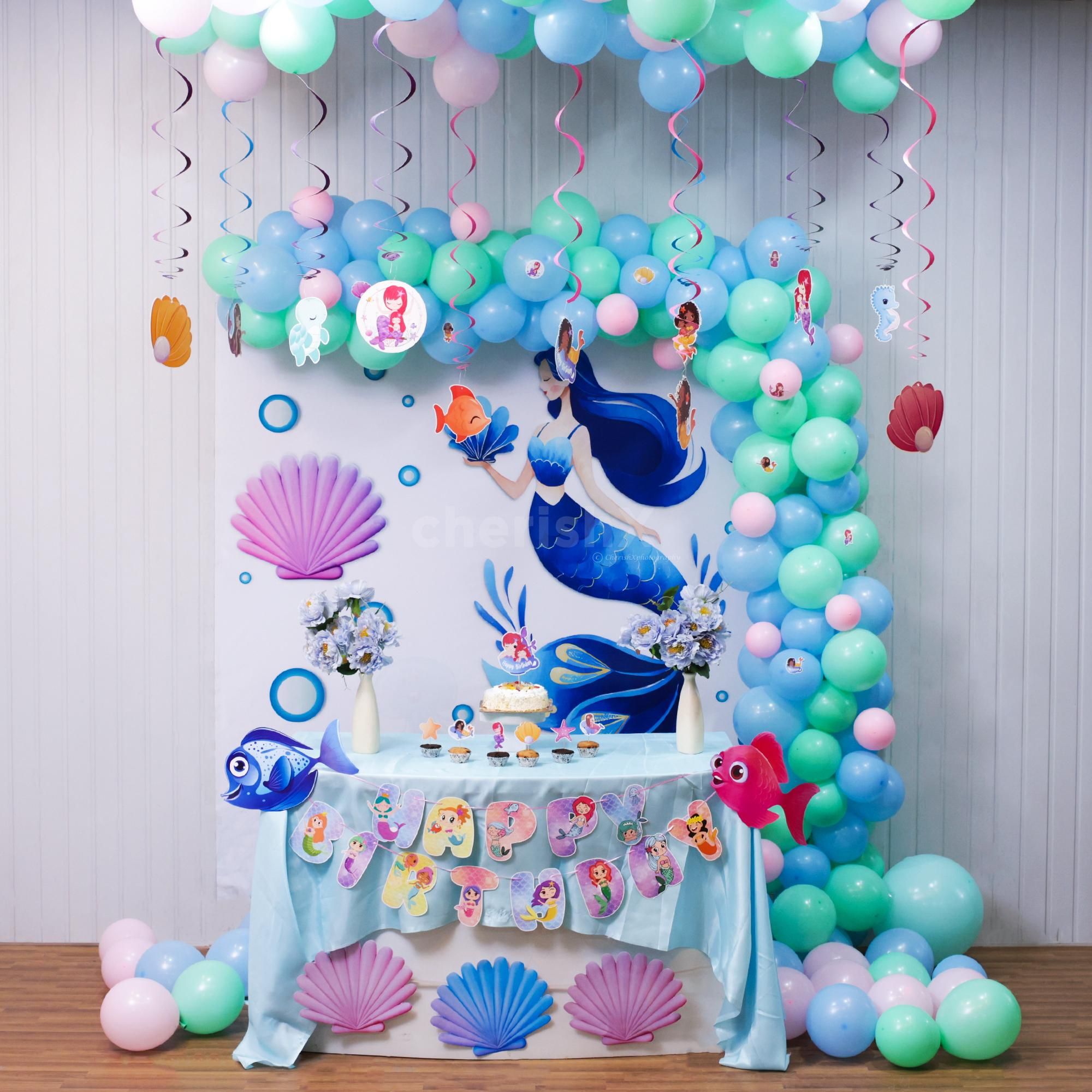 Fish swam in frosting while shells guarded the cupcake stash