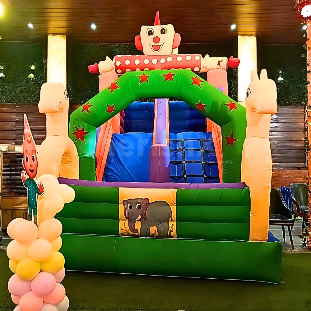 Kids enjoying the Joker Slide Bouncy – 10x15 ft of sliding and bouncing fun
