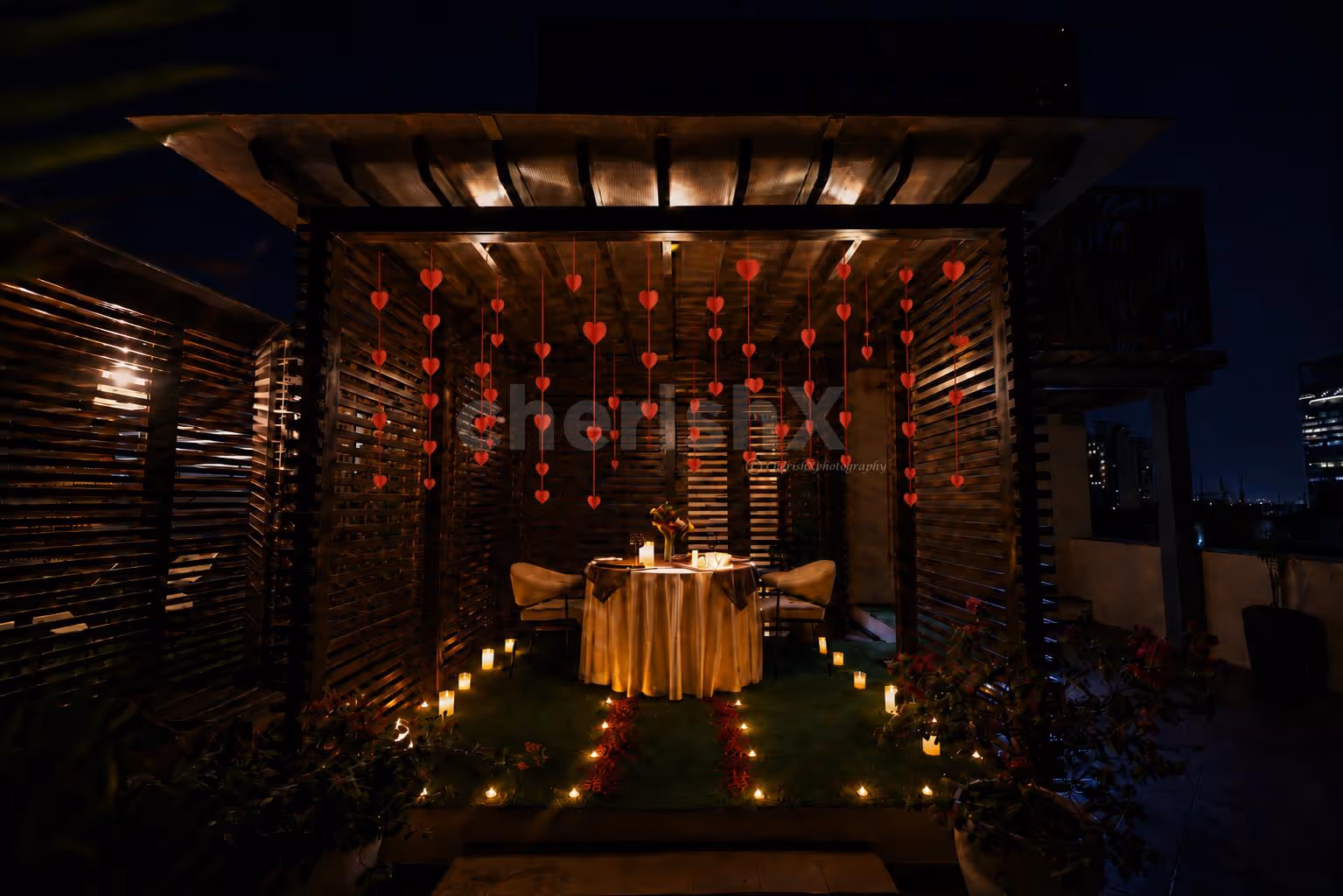 A Fairytale Gazebo Structure Creates A Romantic Scene Outdoors With Delicious Dinner.