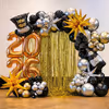 Big black and silver balloons in matte finish outline the decor frame perfectly