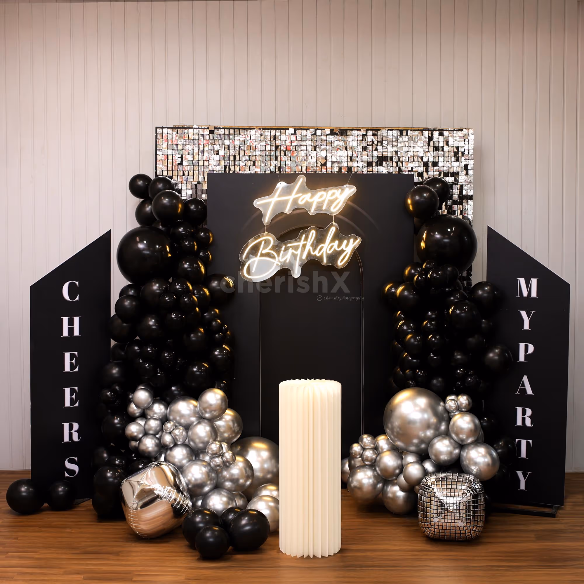 Glam black and silver balloon styling for an ageless birthday style.
