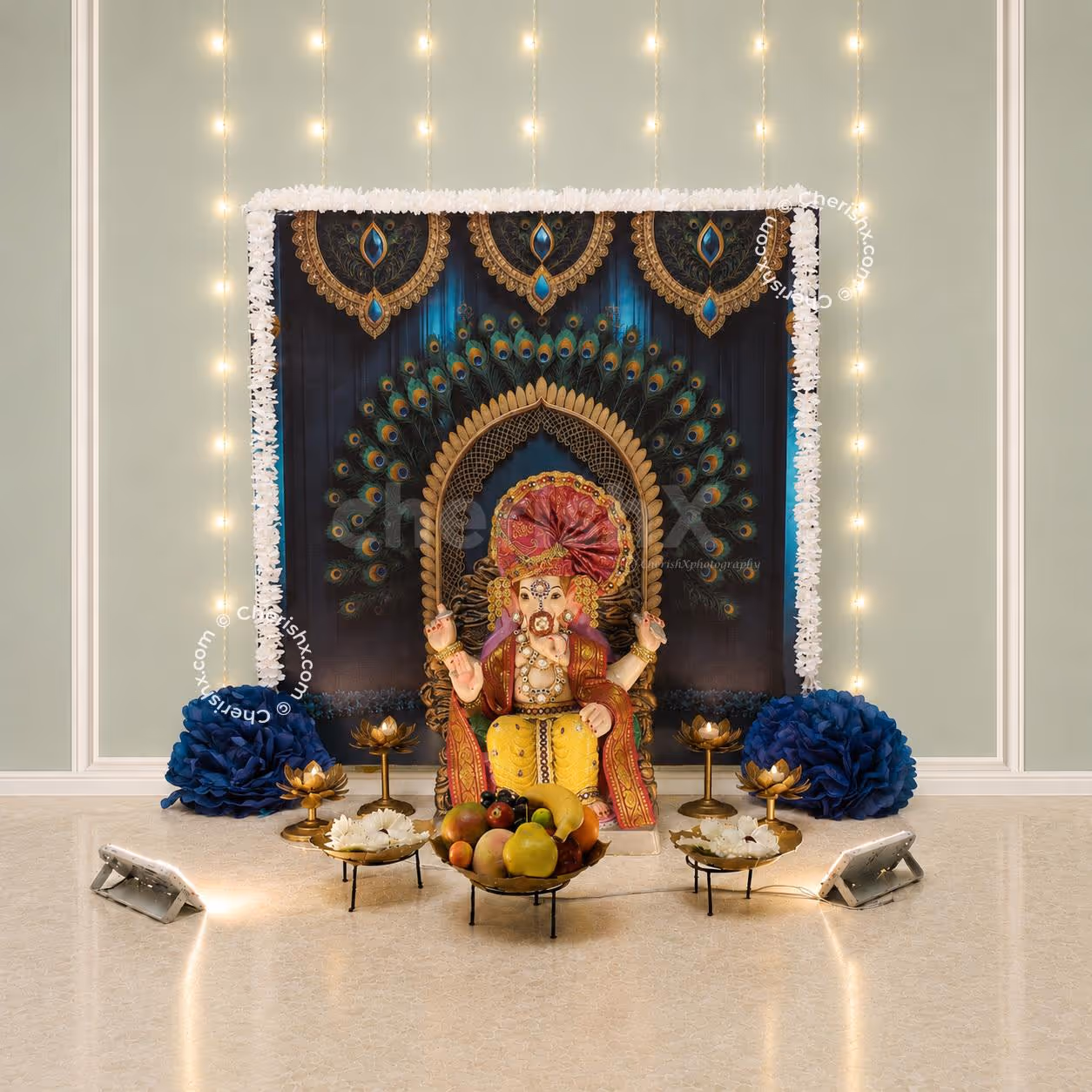 Peacock Elegance DIY Backdrop Decoration Kit for Ganpati decoration, peacock theme backdrop, gold stand, white garlands, blue pom poms.