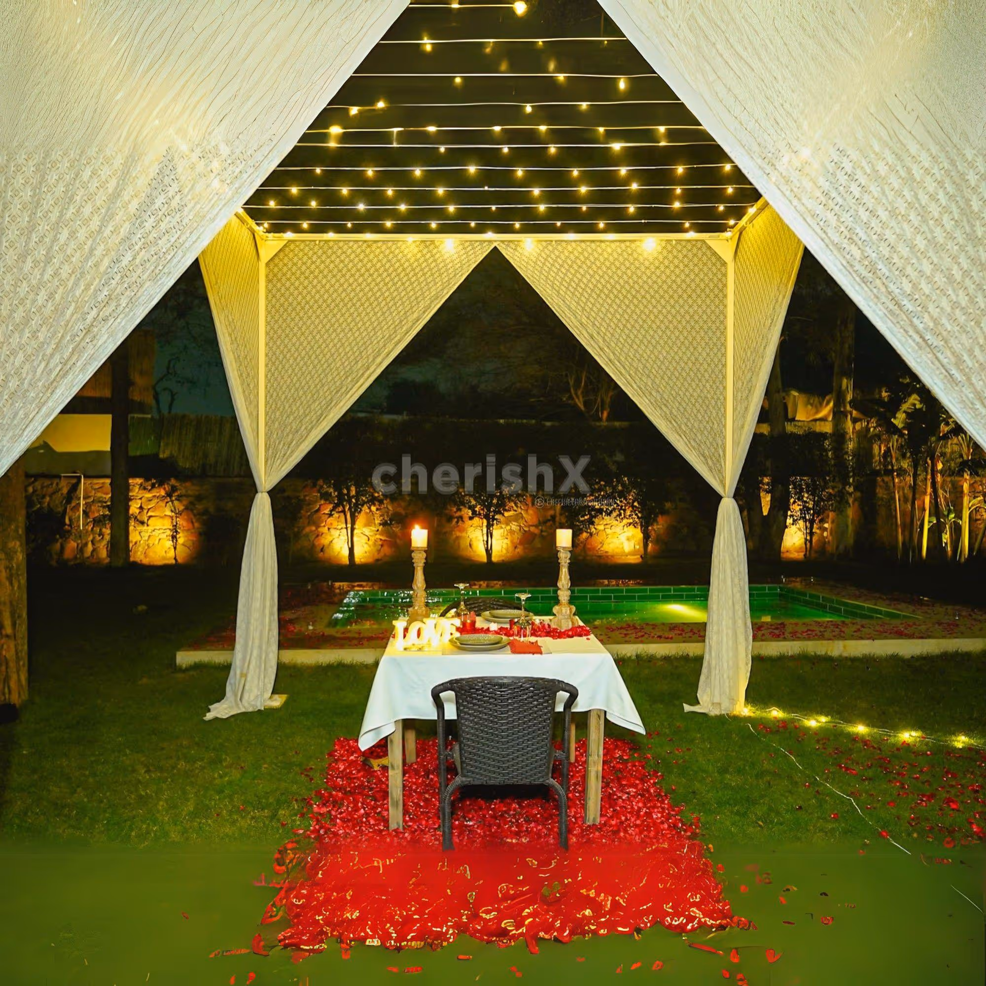 Valentine’s poolside cabana dining setup with personalised table decor