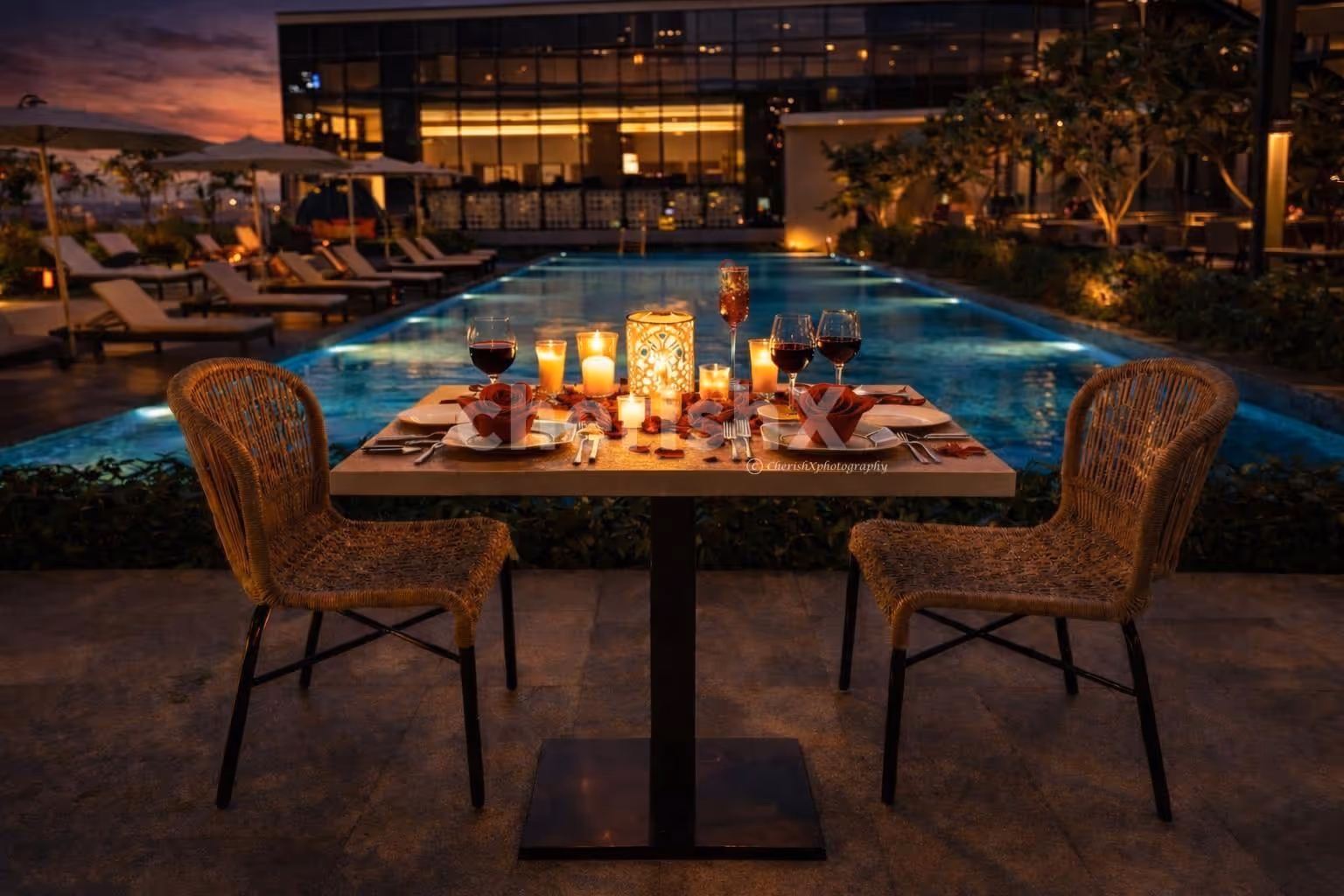 The beautiful surroundings guarded by the blue waters of the pool make this diner even more romantic