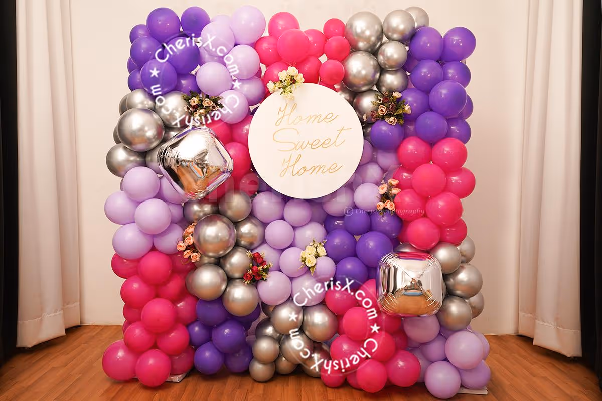 Have an unforgettable housewarming with these special purple and silver balloon decorations.