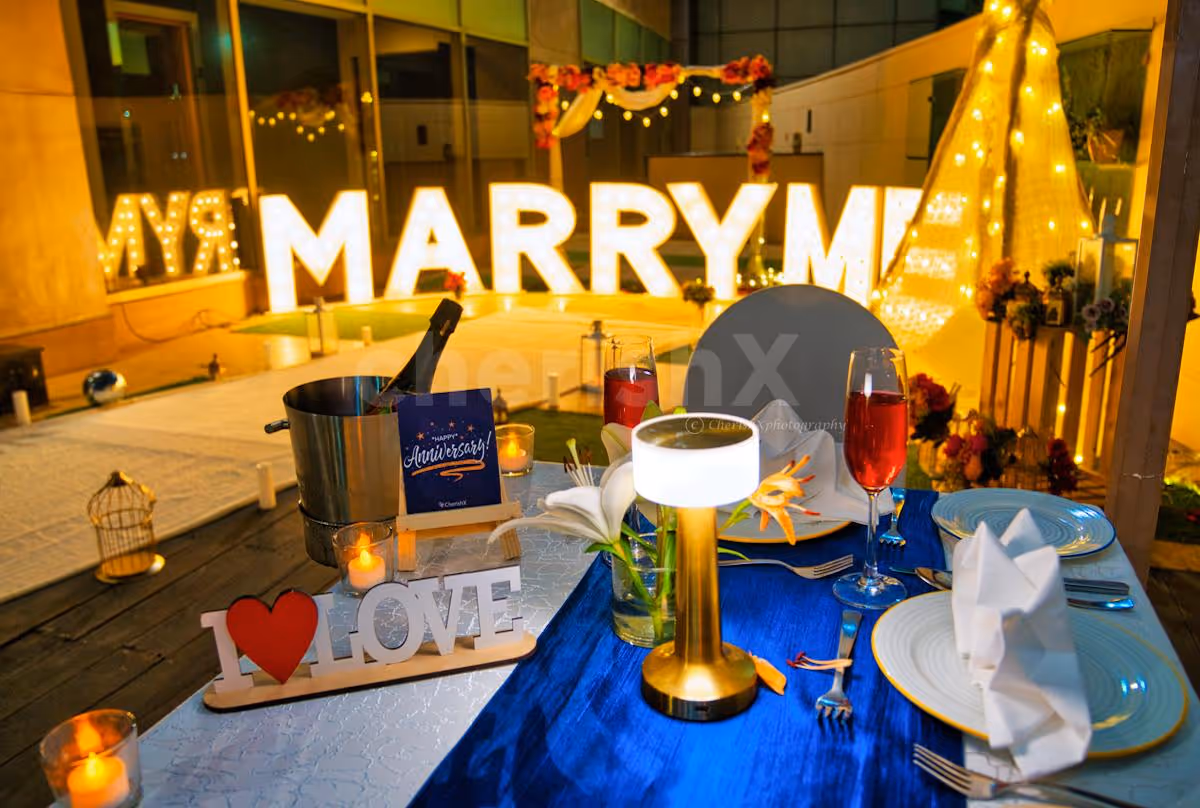 Whimsical elegance poolside decorations illuminated by soft pixel lights.