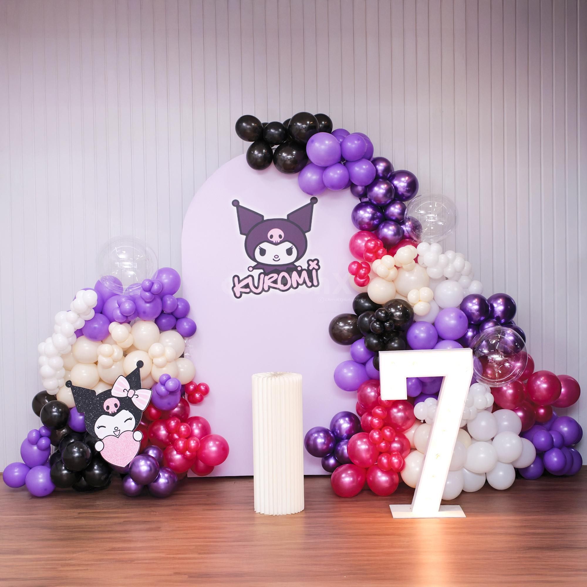 Funky Kuromi birthday background with purple and black hues.