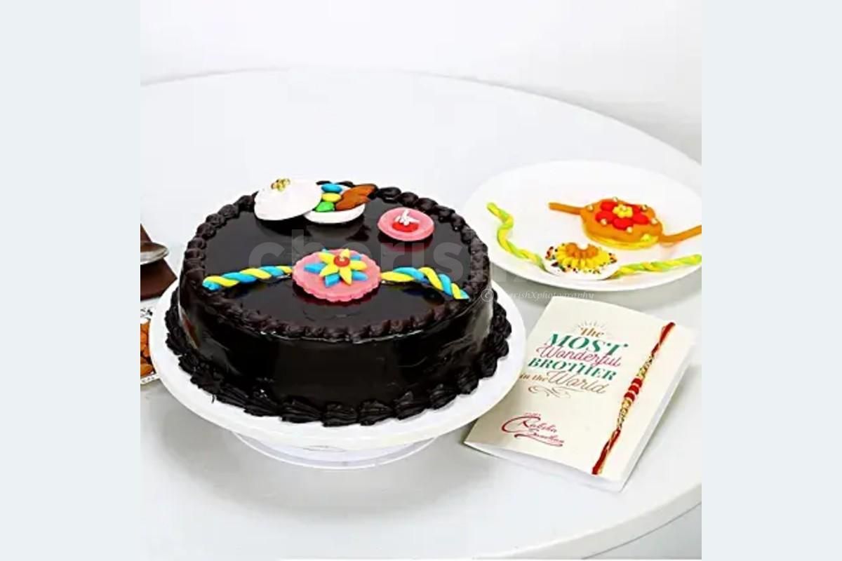 Delicious Rakhi Designer Truffle Cake (Half Kg) delivered fresh at your doorstep.