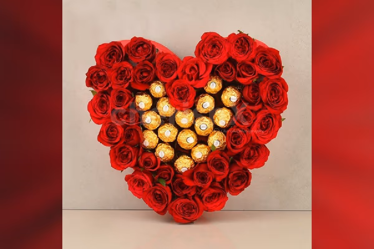 Beautiful Red roses and ferrero rocher heart arrangement