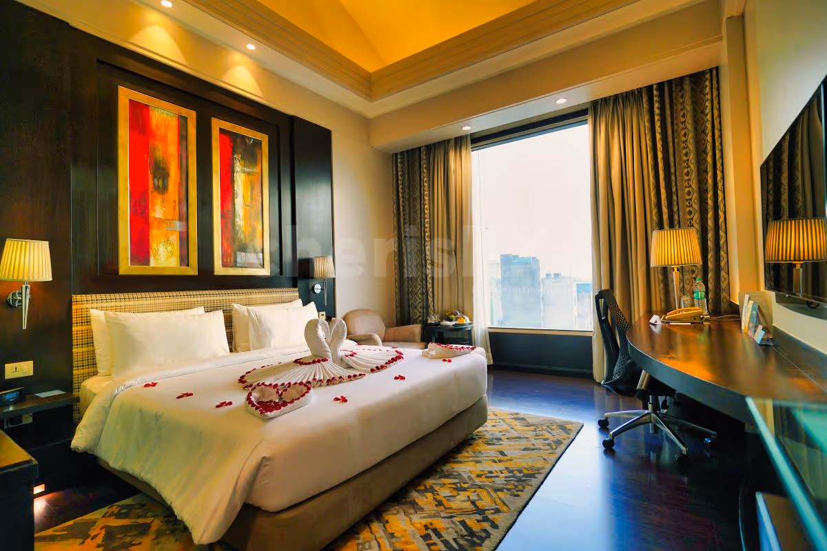 Rose petals on the bed will add a romantic flair between the two.