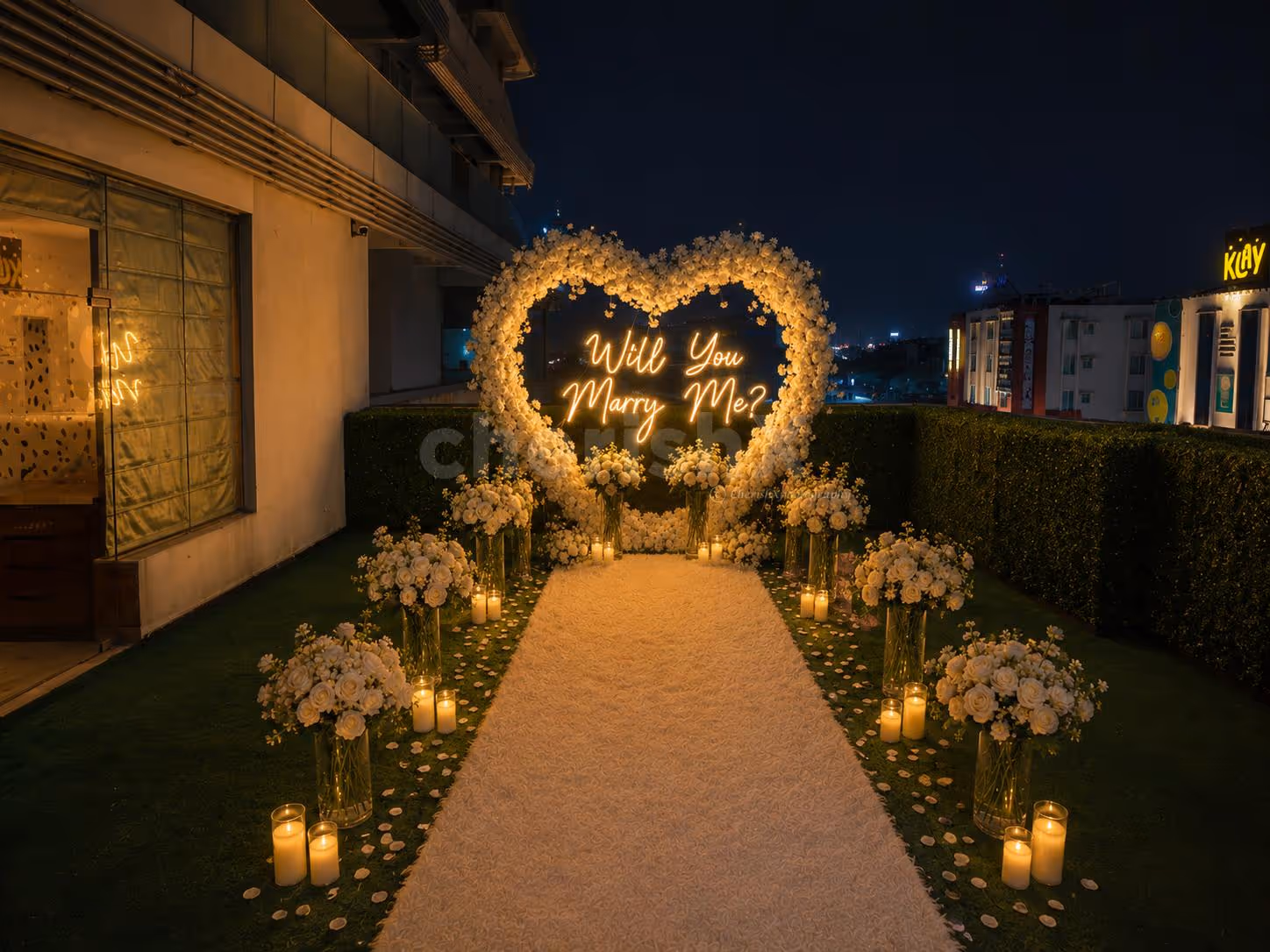 Elegant open-air proposal dinner for couples with personalized décor, ambient lighting, and premium butler service.