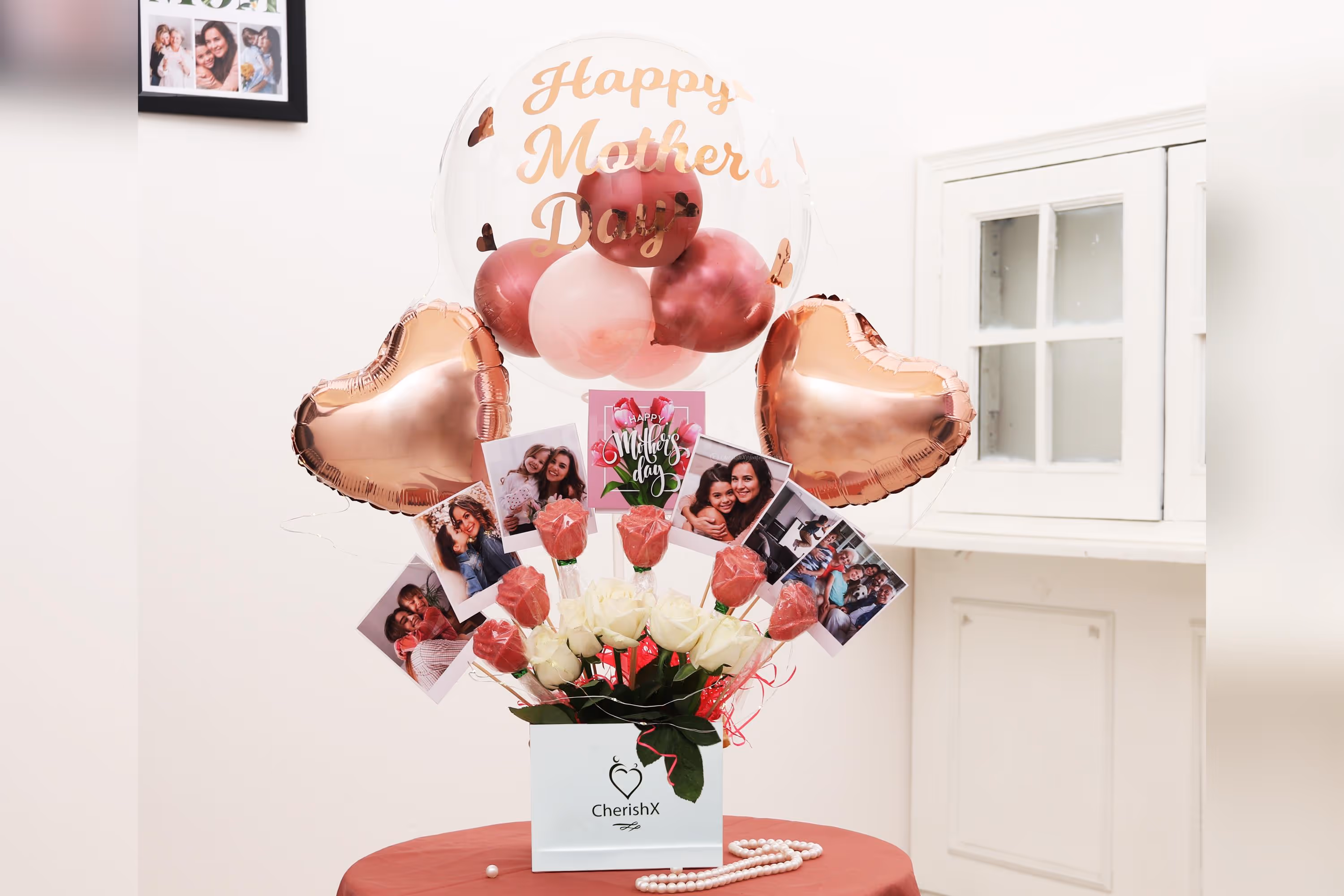 CherishX has launched an Exclusive Rose Gold Mother’s Day Gift Bucket filled with Balloons and more to help you make the Day Memorable for your Mother.