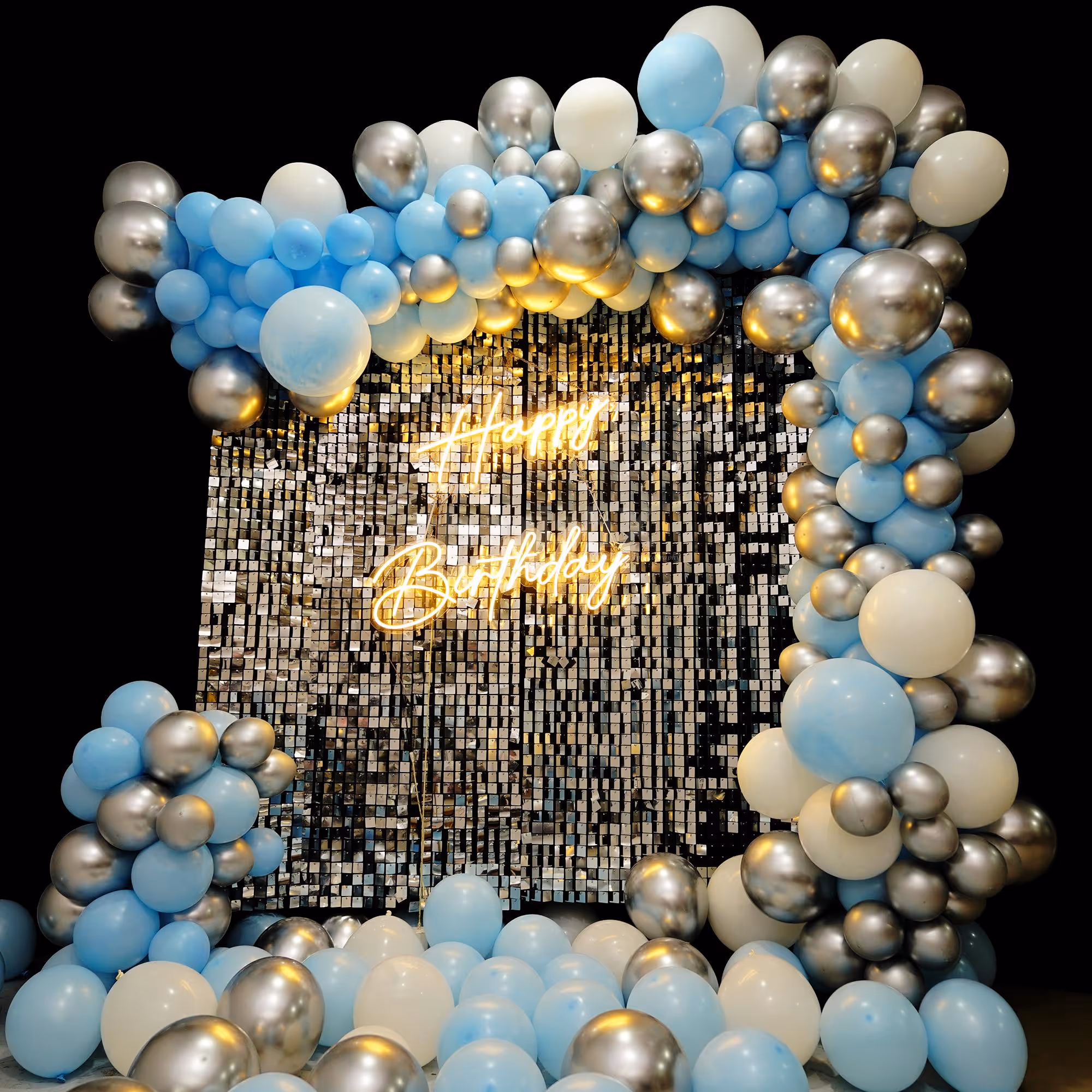 The whimsical and dreamy balloons with a royal blend of colours such as silver chrome, blue, and white latex give an inviting vibe.