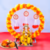 Orange and Yellow garlands on the ring add playful energy to the prayer