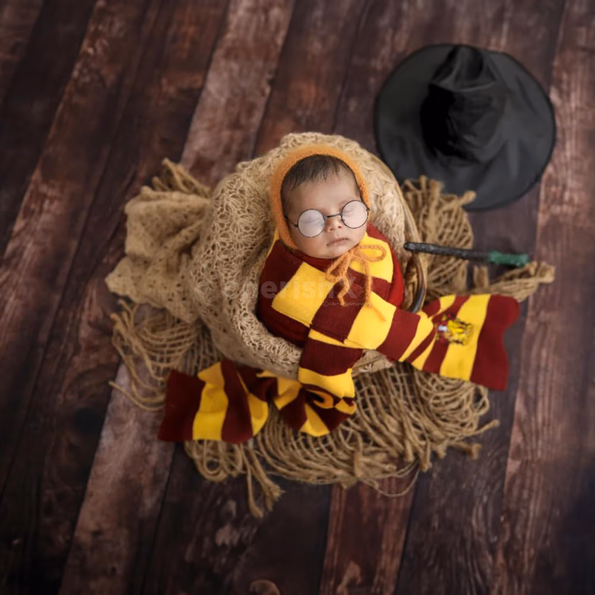 Charming Delight: Baby’s joyful expression in a beautifully styled scene.
