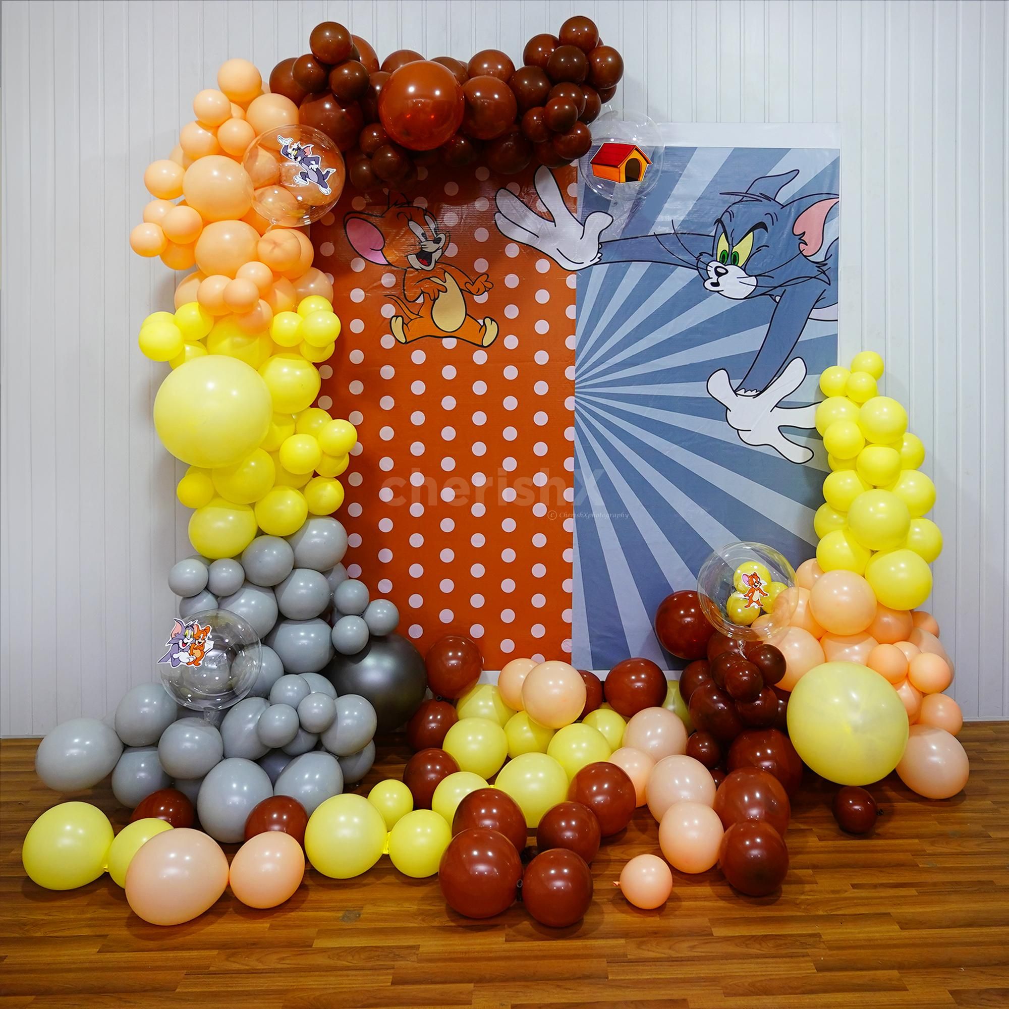 Our playful backdrop and balloon arch create the perfect setting for a memorable birthday party.