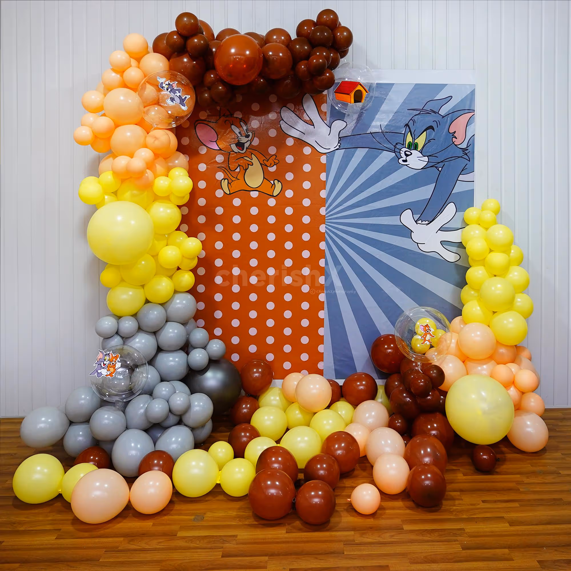 Our playful backdrop and balloon arch create the perfect setting for a memorable birthday party.