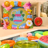 Tropical pool party theme with vibrant foil balloons.