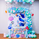 Fish swam in frosting while shells guarded the cupcake stash