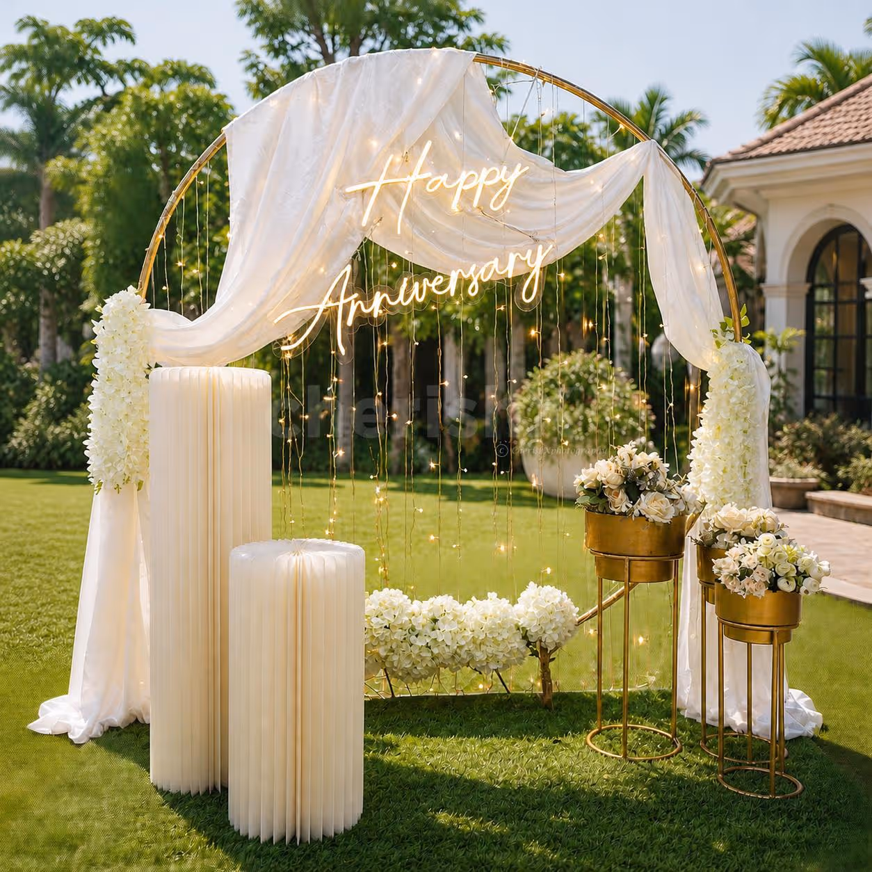 Celebrate your anniversary surrounded by the exquisite ambience of white floral ring decorations.