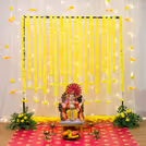 White net is neutral and soothing looking, allowing the yellow garlands and tassels shine and create contrast.